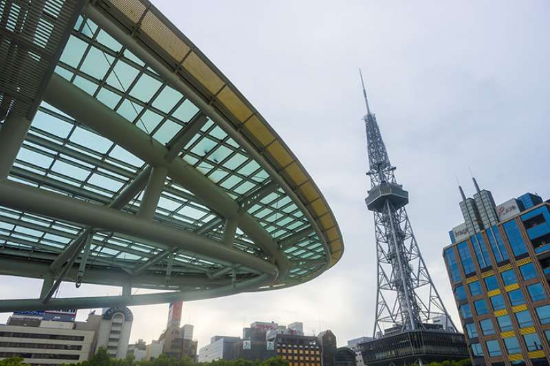 Aichi Private Tour - Oasis 21 with glass top and TV tower, both are Nagoya's landmarks.