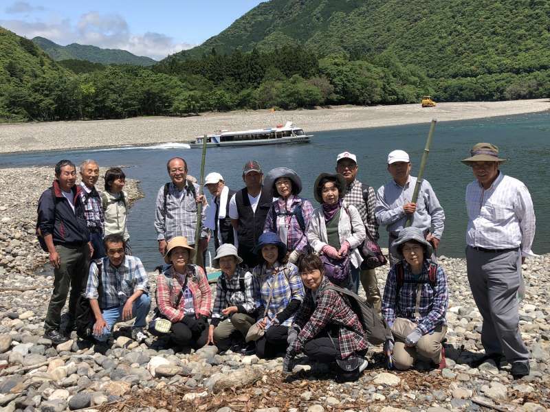 Wakayama Private Tour - We rode a water jet boat( behind us in this photo) to “Doro Haccho” george and walked on the ancient road.