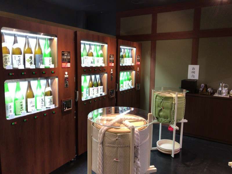 Yokohama Private Tour - Vending machines selling a cup of various types of sake. Would you like to taste one?