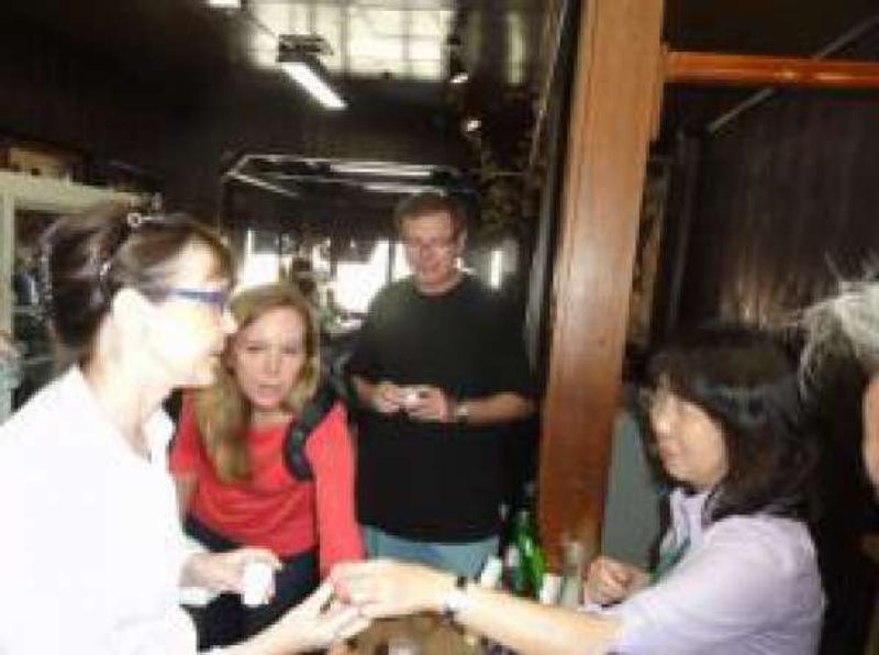 Shizuoka Private Tour - American family tasting sake in the brewary in Fujinomiya City