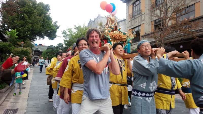 Kanagawa Private Tour - Enjoying a Japanese summer festival in front of the Zenkoji Buddhist temple in 2016.