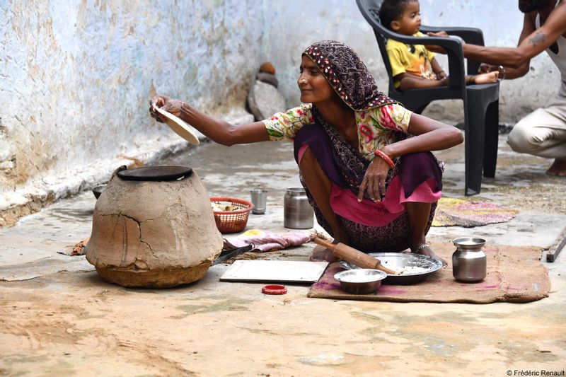 Himachal Pradesh Private Tour - Local village woman cooking food at Rajasthan