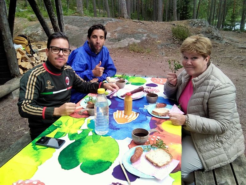 Southern Finland Private Tour - Mexican guys having a break in the forest