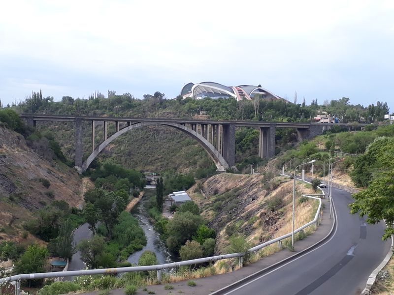 Yerevan Private Tour - Kievian bridge in Yerevan and the sport complex behind it