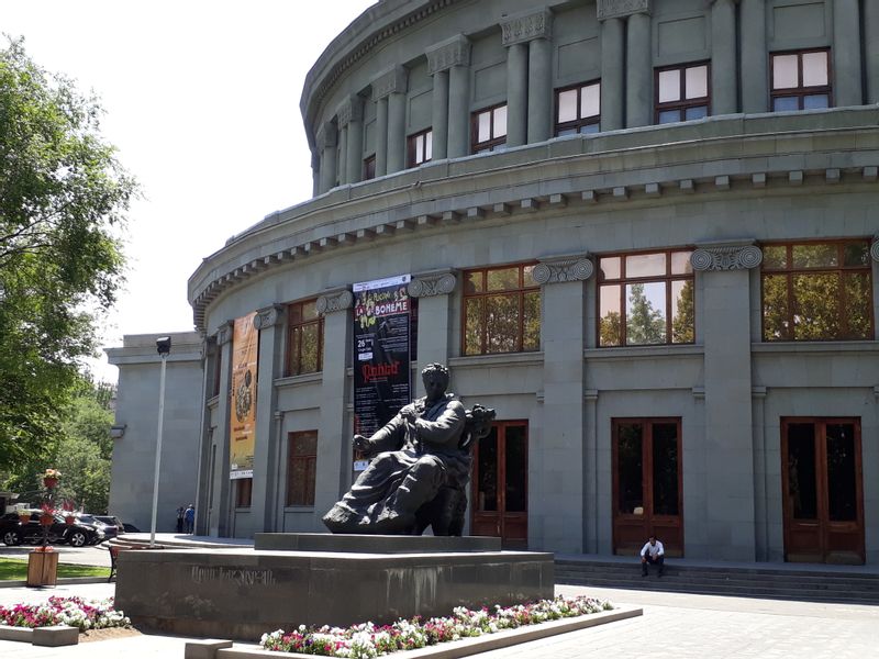 Yerevan Private Tour - statue of famous Armenian composer Aram Khachaturyan in front of the opera house in Yerevan