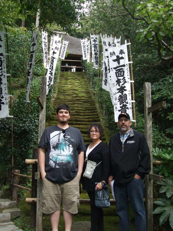 Kanagawa Private Tour - The white flags and moss-covered staircase are impressive.