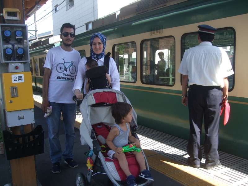 Kanagawa Private Tour - With one of the most popular local train, Enoden, at Inamuragadaki station