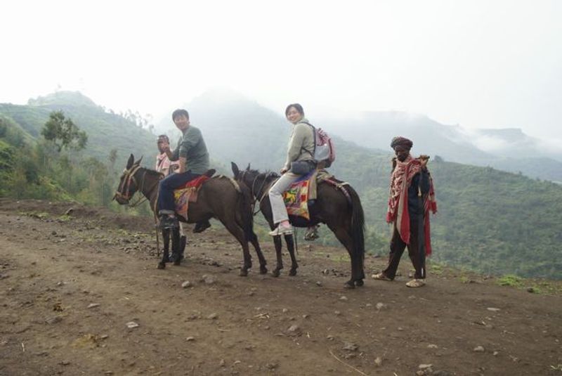 Addis Ababa Private Tour - Mursi woman with her kids/Omo valley