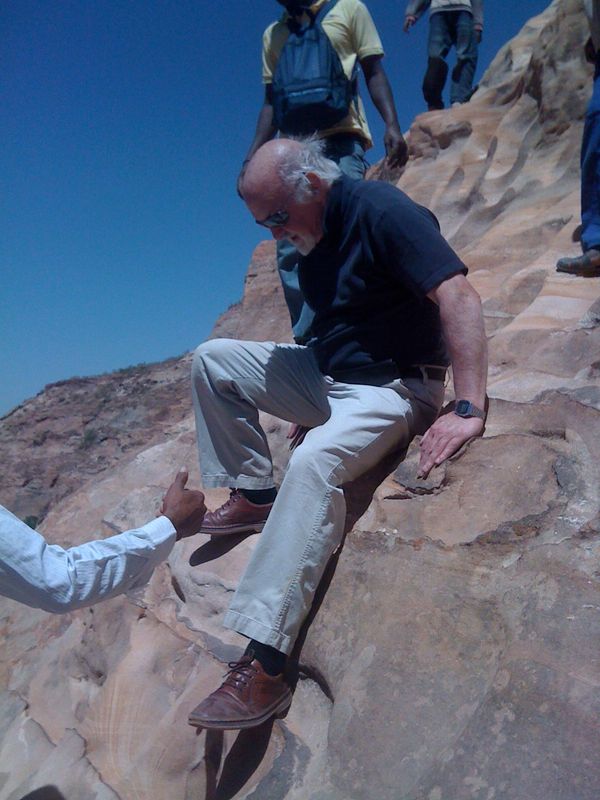 Addis Ababa Private Tour - Customer coming down from one of the Gerealtha rock hewn churches of Mariam Korkor.