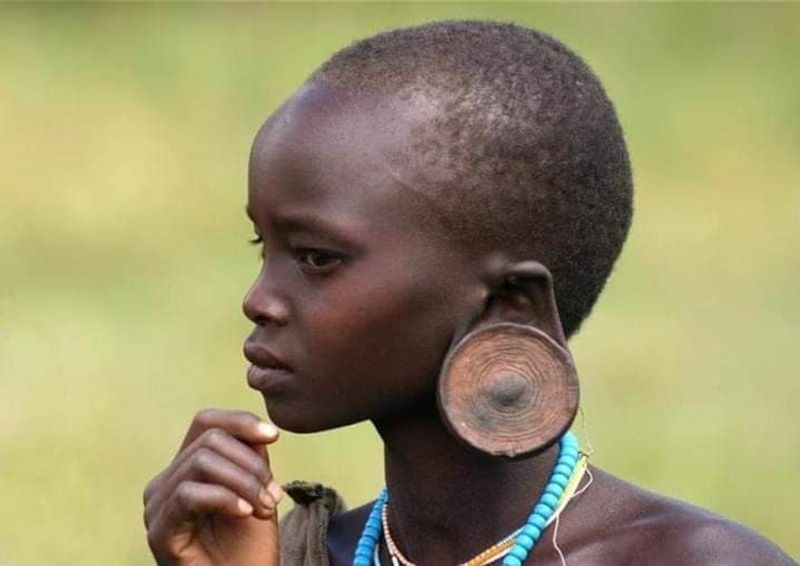 Addis Ababa Private Tour - The Mursi girl with her clay ear ring, Omo valley