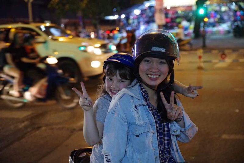 Ho Chi Minh Private Tour - kid enjoyed scooter with our guide