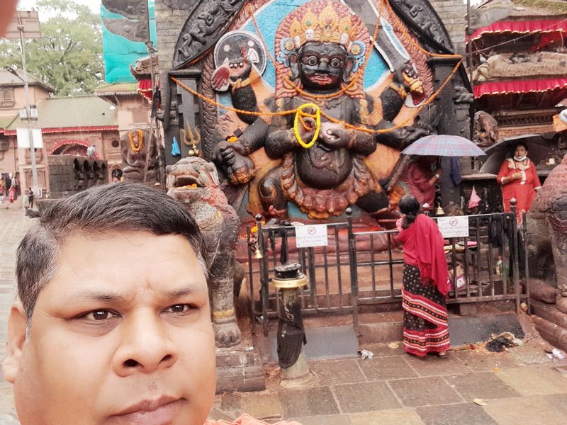 Bagmati Private Tour - At a statue of hindu deity 