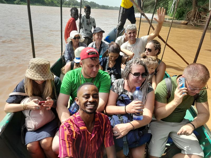 Addis Ababa Private Tour - Crossing omo river with clients 