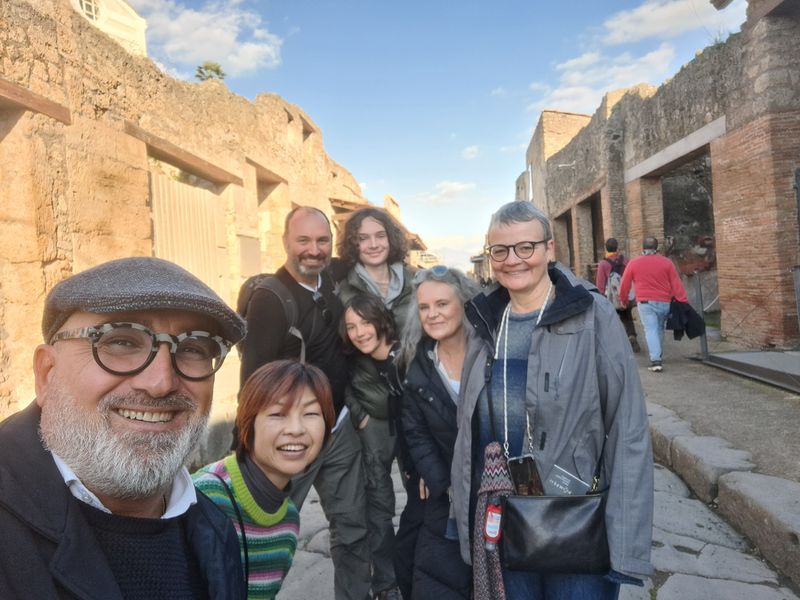 Campania Private Tour - Lello and a family in the main street of Pompei 