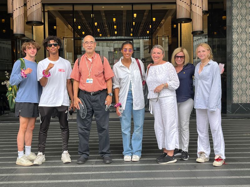 Bangkok Private Tour - A group photo of the travelers with their tour guide.