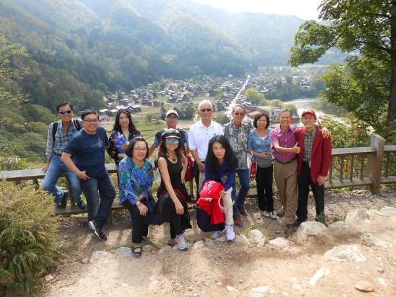 Ishikawa Private Tour - I had a tour guide service for 10 Malaysian group. The photo was taken at the observation deck of Shirakawago. 