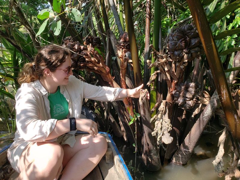 Can Tho Private Tour - Picking up some water coconut