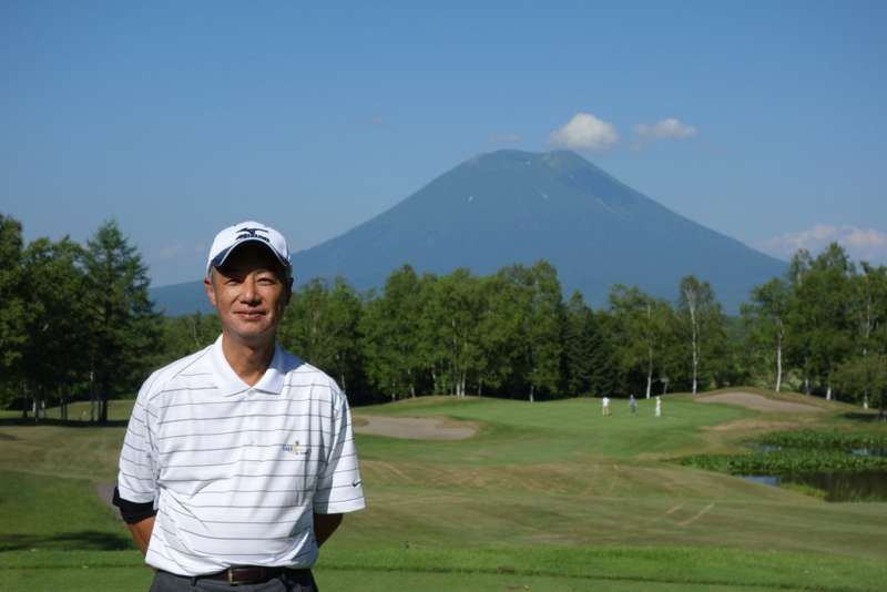 Yokohama Private Tour - This picture was taken at a golf course in Hokkaido. The mountain behind me is Youtei-zan which is called Ezo-fuji.