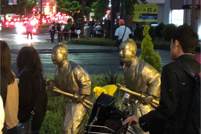 Kagoshima Private Tour - On the sidewalk at the Kajiya-cho intersection, there are bronze statues of young boys of Tsugumichi Saigo, Iwao Oyama, and Gonbei Yamamoto. There are seven bronze statues of historical figures called Tokishirube in the city.