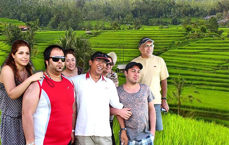 Bali Private Tour - Happy guest at the greatest green rice terraces at Jati Luwih in Tabanan Bali
