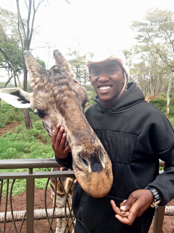 Nairobi Private Tour - With my friend Eddie the giraffe.