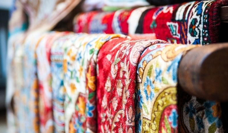 Ras Al Khaimah Private Tour - Dubai Textile Souk