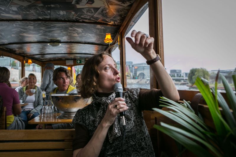 Berlin Private Tour - Janna guiding a ship tour on Spree river, Berlin, Germany