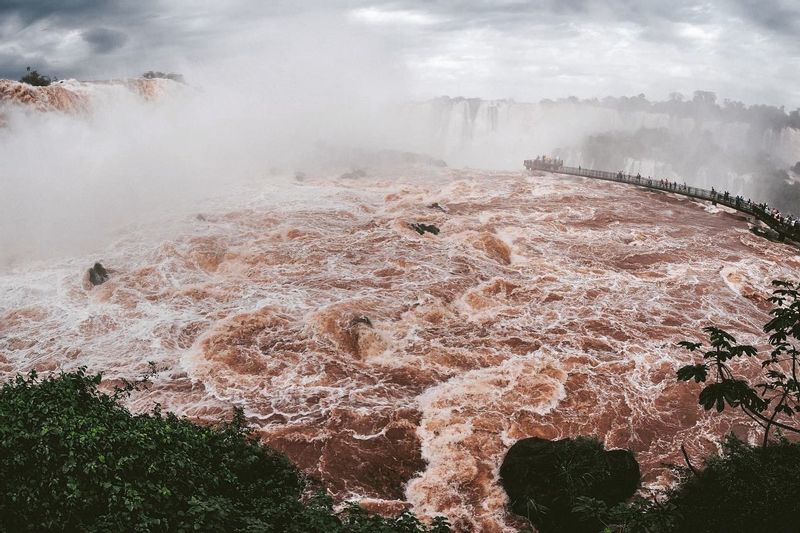 Iguazu Falls (Brazil) Private Tour - Brazilian footbridge image during flood.