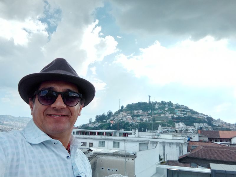 Pichincha Private Tour - Panecillo hill on the back. 