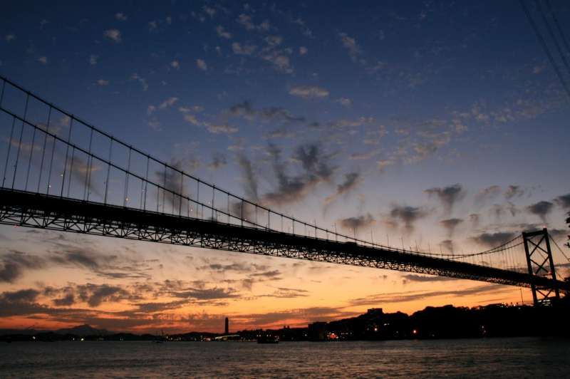 Fukuoka Private Tour - If you ever cross the channel by a tunnel (yes, there is a tunnel under the channel and and you can walk across by around 15 munutes walk!) You may encounter the Kanmon bridge like this. :) 