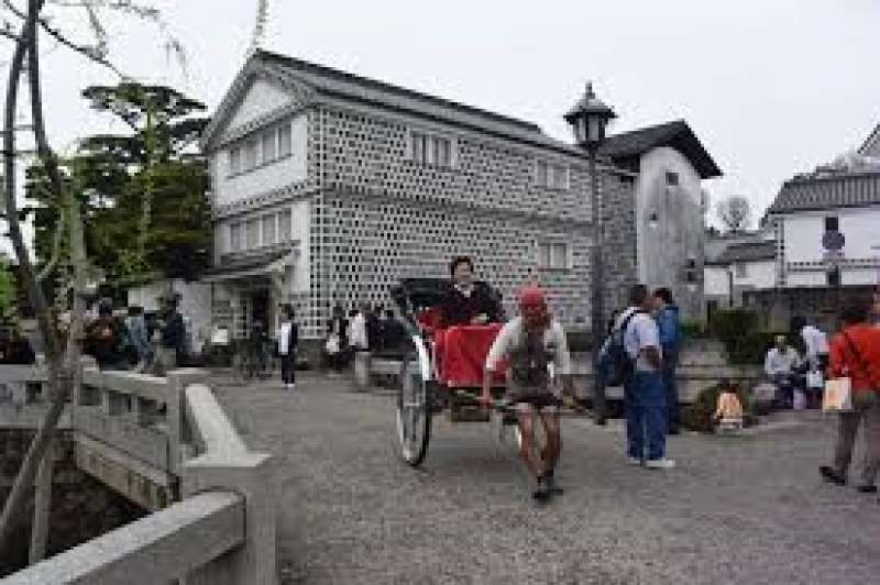 Okayama Private Tour -  This vehicle is jinrikisha, a rickshaw. It was invented by Japanese men in 1869.  It was used as a taxi in those days.  Now it is used for the sightseeing. A young and cool man pull a rickshaw. If you have time, please try the rickshaw. You will be able to taste the feeling of  a Japanese in Meiji Period..  