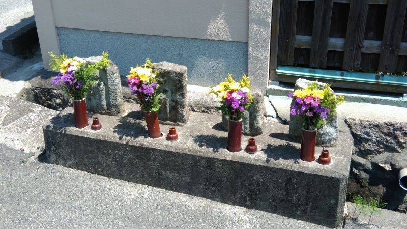 Osaka Private Tour - Stone images on a road side, NARA