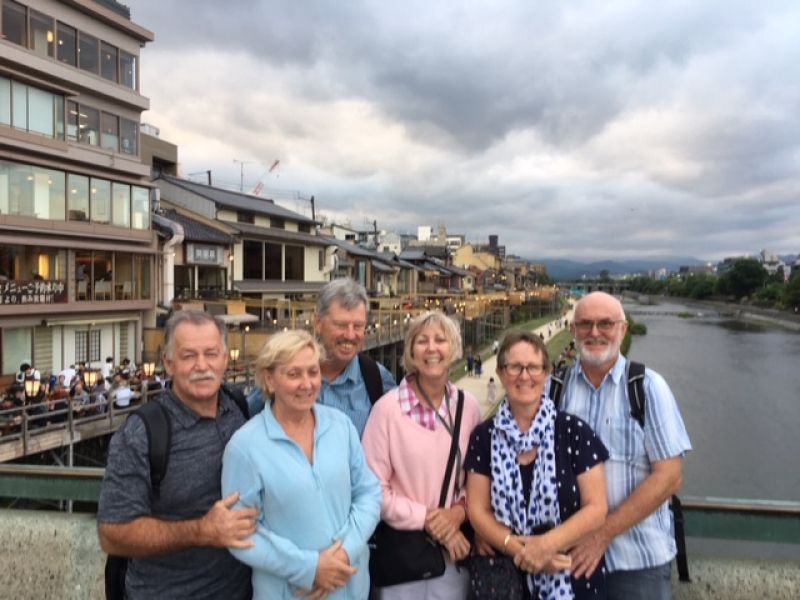 Kobe Private Tour - Cheerful group at a bridge over the Kamogawa River in Kyoto