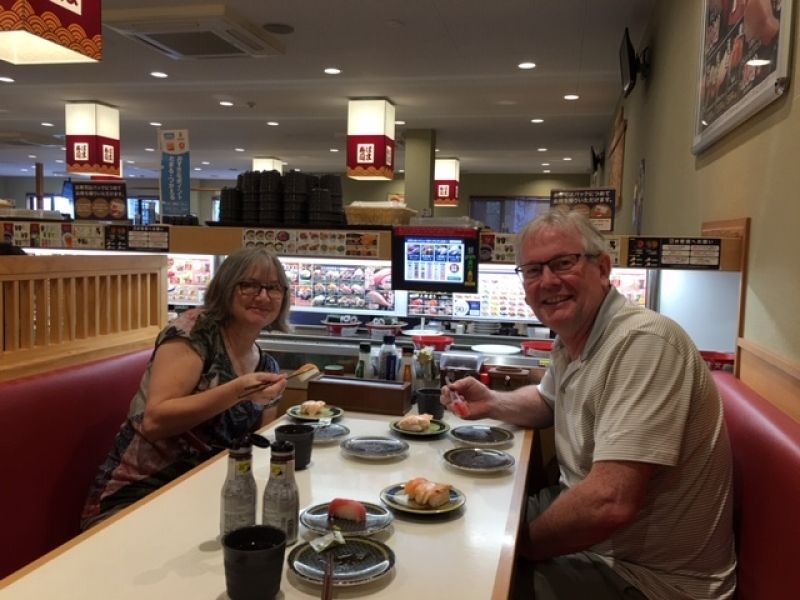 Kobe Private Tour - Wonderful couple exploring Kaiten-zushi, meaning circulating sushi, in Kyoto