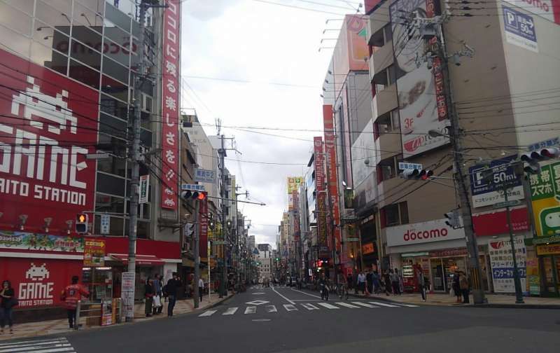 Osaka Private Tour - Nansan street in Den Den Town - entrance to Ura Namba