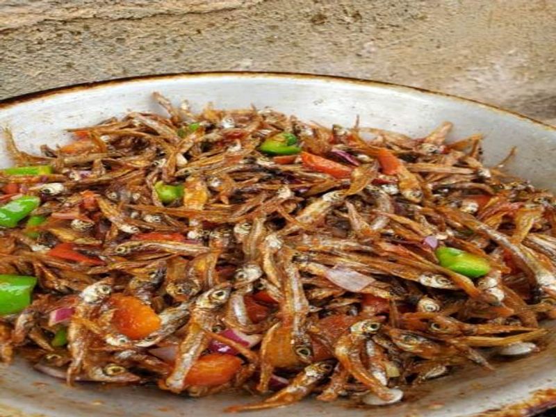 Lusaka Private Tour -  Fried dried kapenta - Kapenta is a type of small fish that is commonly found in Lake Tanganyika. It is often dried and fried in oil.
