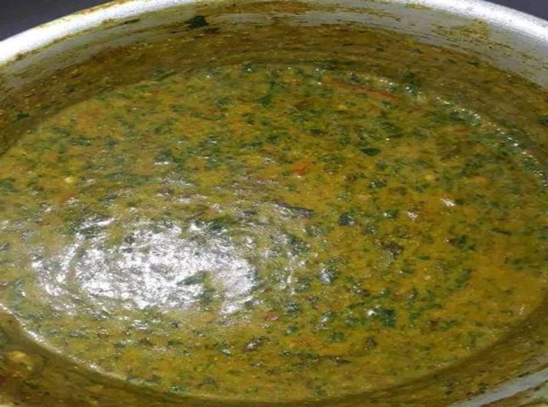 Lusaka Private Tour - Chibwawa yosashila - This is a traditional Zambian dish made with pumpkin leaves, soda, tomatoes, and onion 