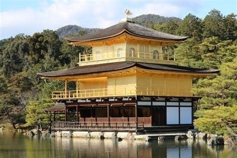 Kyoto Private Tour - The formal name for this temple is the Rokuon-ji Temple. Its brilliant image is reflected on the pond in front to show its beautiful picture.