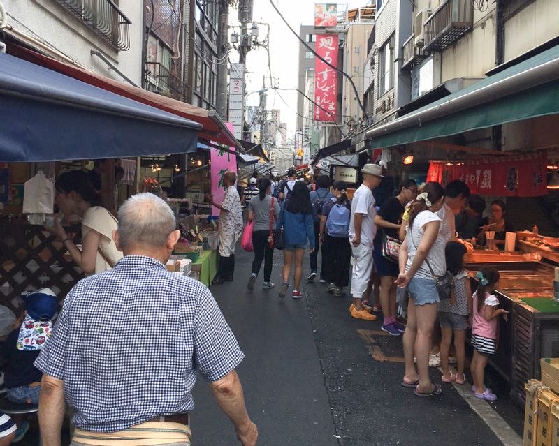 Tokyo Private Tour - Tsukiji Outer Market, a paradise for sushi lovers.  It's always full of energy with fresh seafood shoppers. 