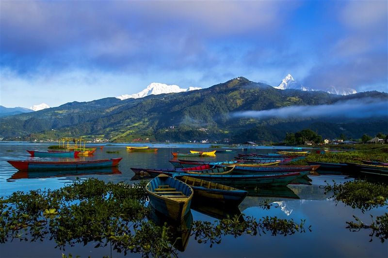 Kathmandu Private Tour - Pokhara's Fewa Lake: Embark on a serene boat journey amidst the tranquil waters, surrounded by the stunning panorama of the Annapurna range.