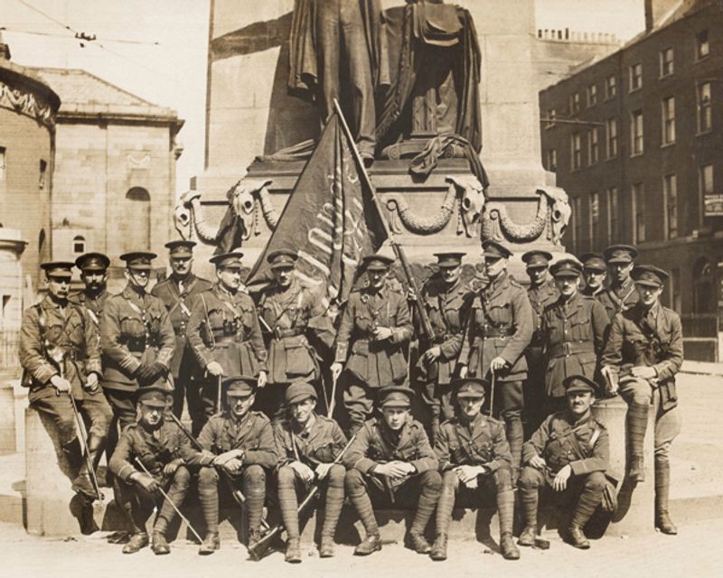 Dublin Private Tour - 1916 - British Army officers with a captured 'Irish Republic' flag.