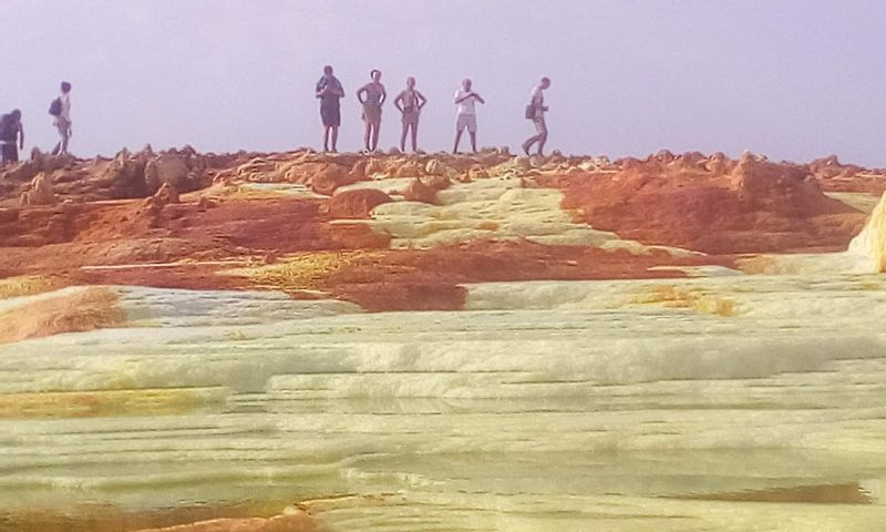 Addis Ababa Private Tour - Customers visiting the colourful 
Sulphuric lake at the main site of Danakil Depression