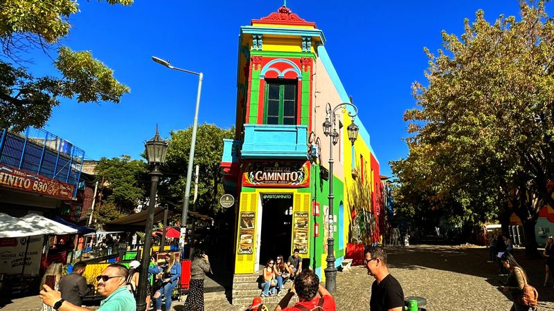 Buenos Aires Private Tour - "Experience the vibrant colors and passion of Caminito in La Boca, Buenos Aires. Walk along this iconic pedestrian street adorned with charming, brightly painted houses. Immerse yourself in the bohemian atmosphere, as tango music fills the air and street performers captivate your senses. Discover local artisans and explore art galleries. Caminito is a must-visit destination that showcases the cultural and artistic spirit of Buenos Aires."