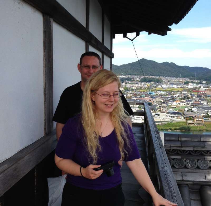 Aichi Private Tour - On the top floor, everyone enjoys panoramic view, while walking along the outdoor balcony. You could imagine what the castle lord was thinking about  when looking down on the town in those days. 