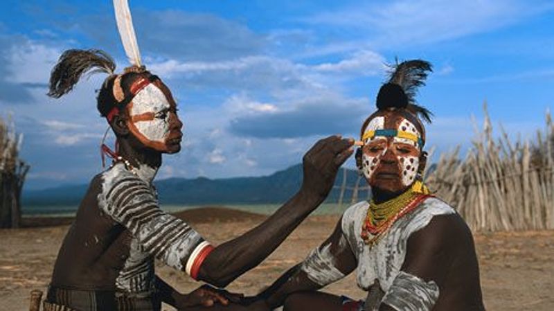 Addis Ababa Private Tour - Young Karo men beautifying themselves /Omo valley 