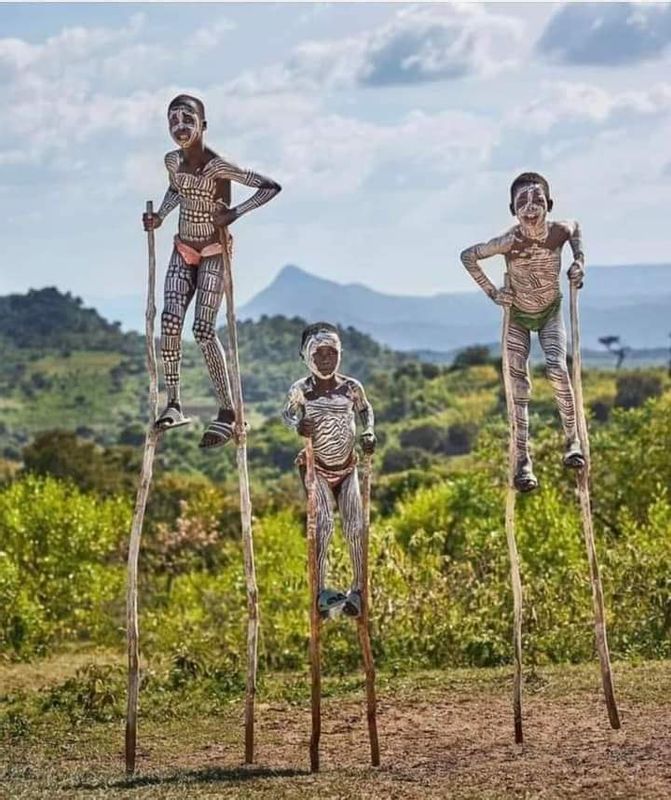 Addis Ababa Private Tour - Bena boys walking on stick, just for photo to get minry