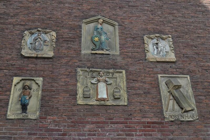 Amsterdam Private Tour - Stone gables at St. Lucieensteeg