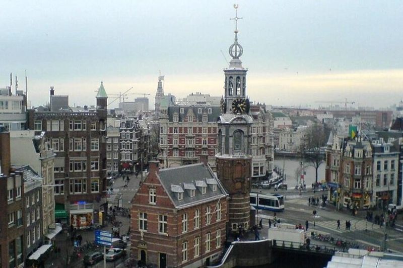 Amsterdam Private Tour - "The Coin Tower" at meeting point of canal Singel and Amstel river