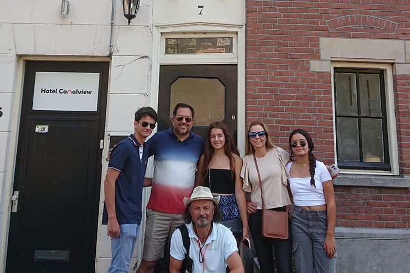 Amsterdam Private Tour - Group photo by smallest Amsterdam's house with Carlos (Colombia) and his family 