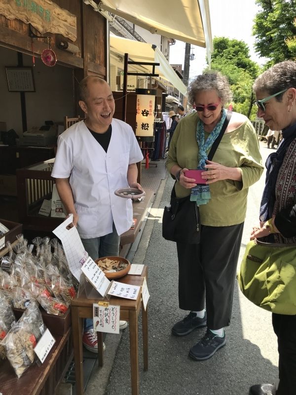 Gifu Private Tour - Each stall or shop sells its specialities such as local foods, flowers and crafts etc. Tourists enjoy both tasting and buying.